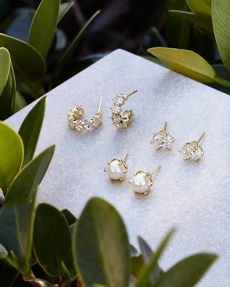  Cailin Gold Crystal Huggie Earrings In White Crystal