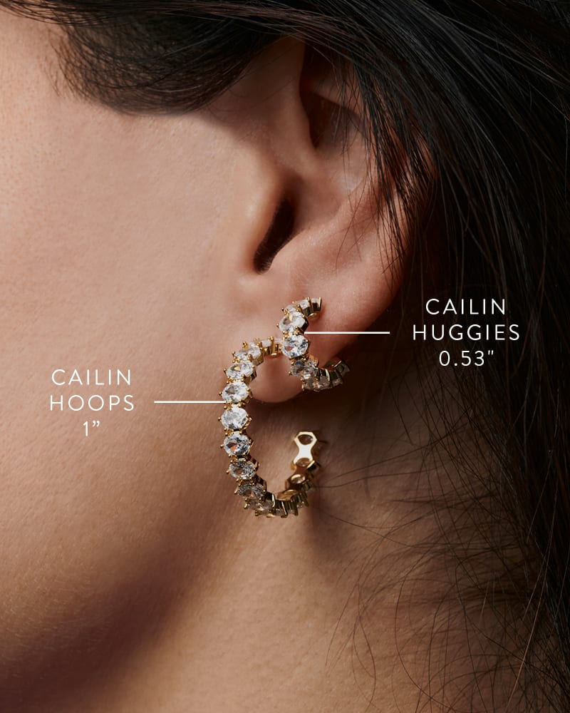  Cailin Gold Crystal Huggie Earrings In White Crystal